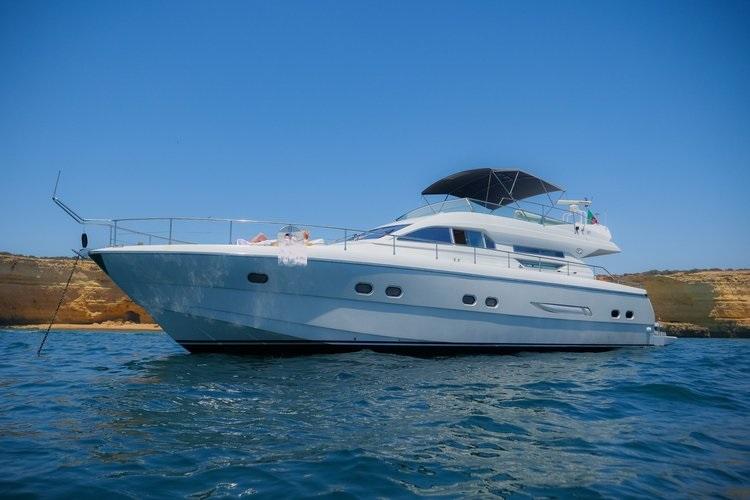 Discover Vilamoura surroundings on this Flybridge VZ boat