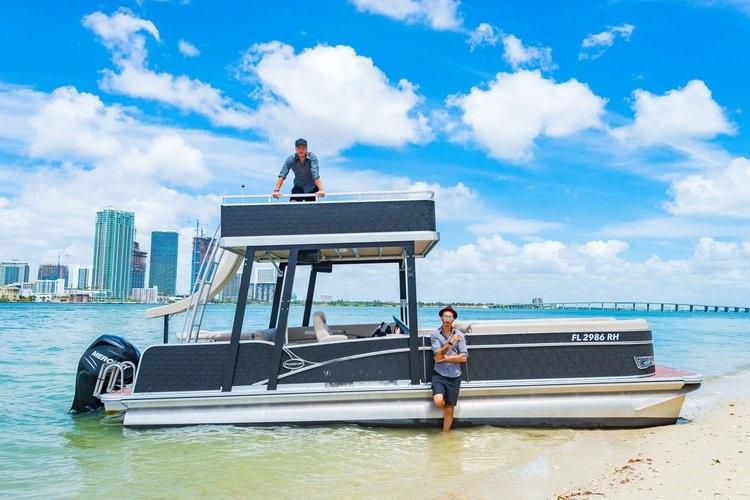 Up to 12 persons can enjoy a ride on this Pontoon boat