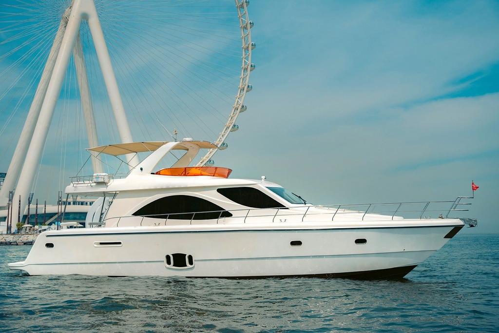 Up to 23 persons can enjoy a ride on this Flybridge boat