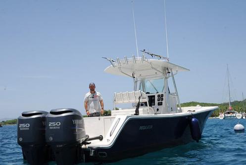 Discover Cruz Bay surroundings on this 32FS Regulator boat