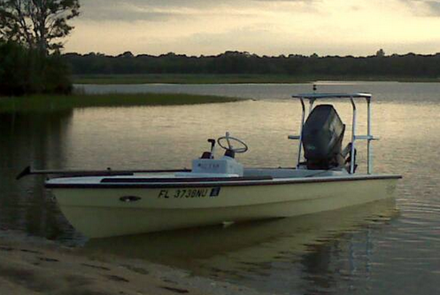 Up to 4 persons can enjoy a ride on this Deck boat boat