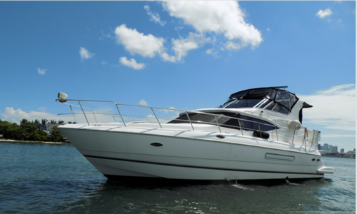 This 48.0' Cruisers cand take up to 12 passengers around Miami