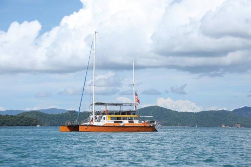 Hop aboard this amazing Sail 55' Catamaran  rental in Malaysia!