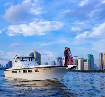 Discover Philippines in style boating on this motor yacht charter
