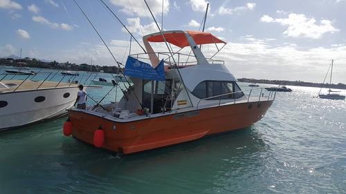 Up to 15 persons can enjoy a ride on this Cuddy cabin boat