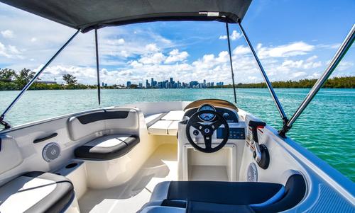 Discover Key Biscayne surroundings on this Element Bayliner boat