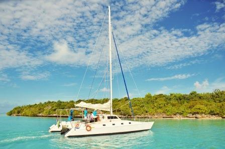 Experience Trou d'Eau Douce on board this elegant catamaran