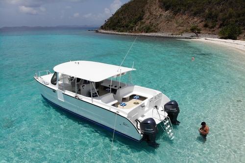 Brand new big & comfortable power catamaran with tons of shade