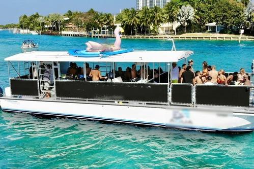 Miami's Premier Party Boat Adventure: Spacious 45-Guest PartyBoat with Captain, Mate, and Relaxing Floats - Your Ideal Event on the Water!