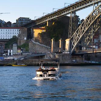Discover Porto surroundings on this 22 Tracker boat
