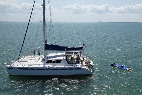 48 ft sailing catamaran ideal to party, connect with nature, tan and relax in Biscayne Bay