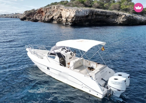 Discover Cala D`Or surroundings on this WA Capelli 28 boat