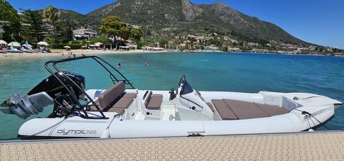 Rigid inflatable boat rental in perigiali port, Greece