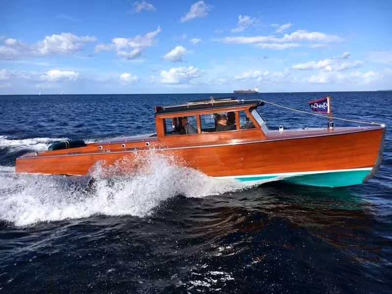 Up to 8 persons can enjoy a ride on this Classic boat